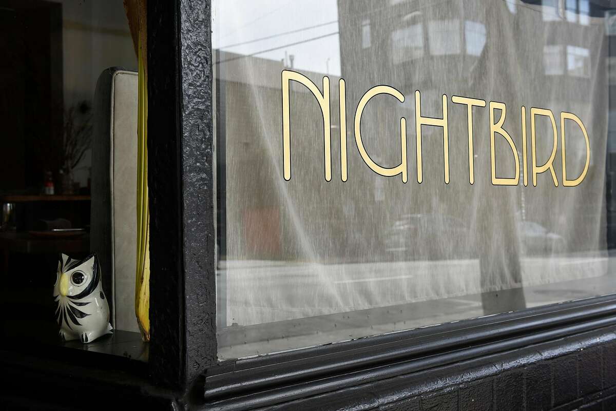 An owl figurine sits in the front window at Nightbird restaurant in San Francisco in 2018.