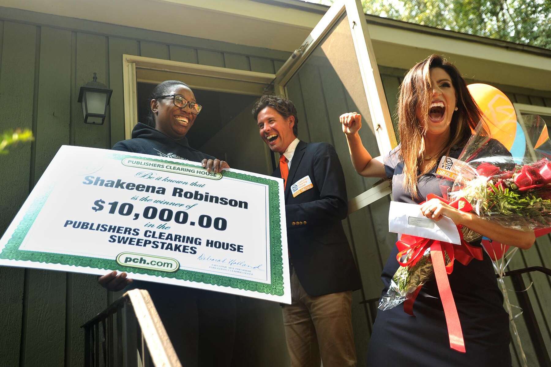 Milford woman gets surprise visit, check from Publishers Clearing House