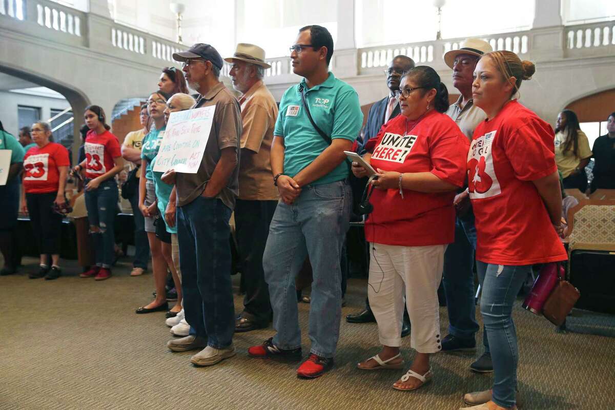 Members of various organizations stand in support as citizens speak in favor of an ordinance mandating paid sick leave during a San Antonio City Council meeting, Thursday, August 16, 2018. The Council went on to approve the ordinance 9-2.
