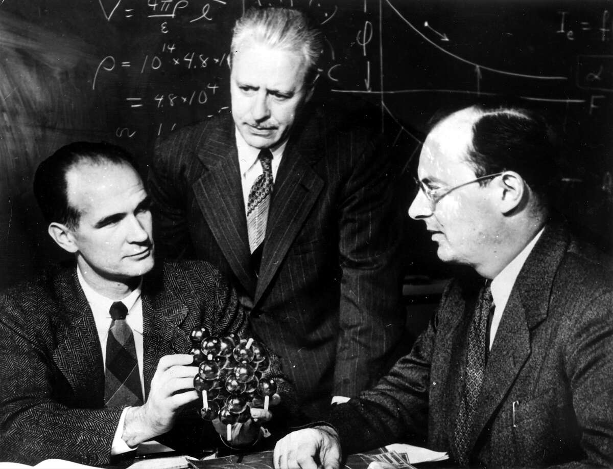 William B. Shockley is shown with co-Nobel Prize in Physics winners Walter H. Brattain (center) and John Bardeen on April 11, 1956,
