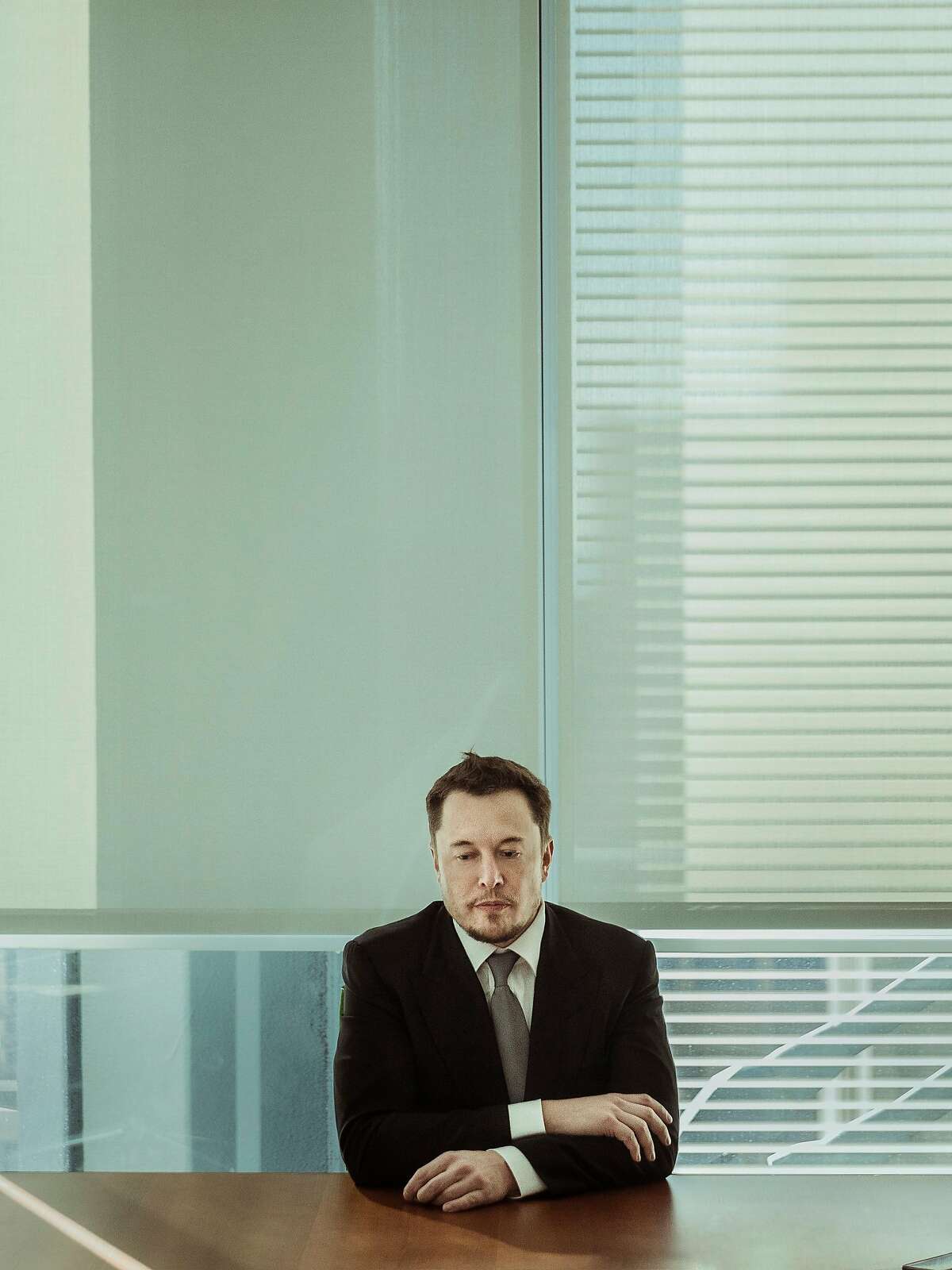 FILE -- Elon Musk at the New York Times building in New York, Dec. 14, 2016. Now in 2018, the year has only gotten more intense for Musk, the chairman and chief executive of the electric-car maker Tesla, since he abruptly declared on Twitter in mid-August that he hoped to convert the publicly traded company into a private one. The episode kicked off a furor in the markets and within Tesla itself, and he acknowledged on Aug. 16 that he was fraying. (Sasha Maslov/The New York Times)