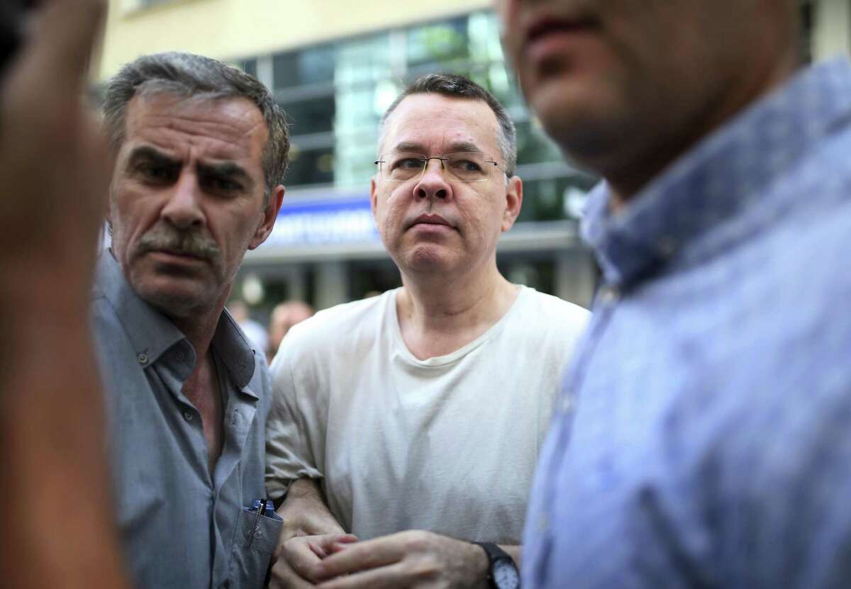 Andrew Craig Brunson, an evangelical pastor from Black Mountain, North Carolina, arrives at his house July 25 in Izmir, Turkey. Brunson, who had been jailed in Turkey for more than one-and-a-half years on terror and espionage charges was released and will be put under house arrest as his trial continues. He is essentially a hostage because Turkey wants the U.S. to extradite a cleric living here.