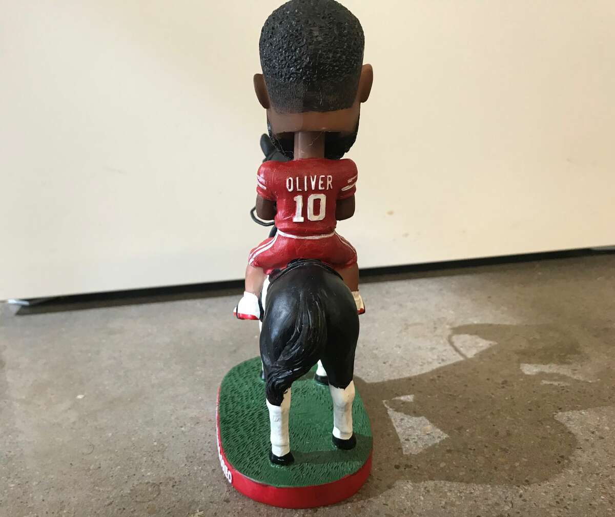 A look at the Ed Oliver bobblehead that University of Houston mailed to college football media members.
