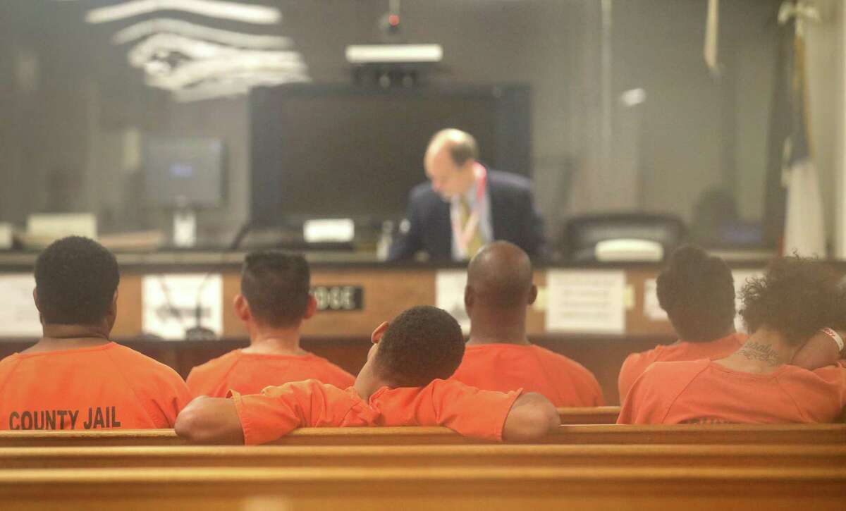 Defendants — shown here in Houston last year — should have the benefit of counsel even at initial bail hearings. Too often in Bexar County, they do not.