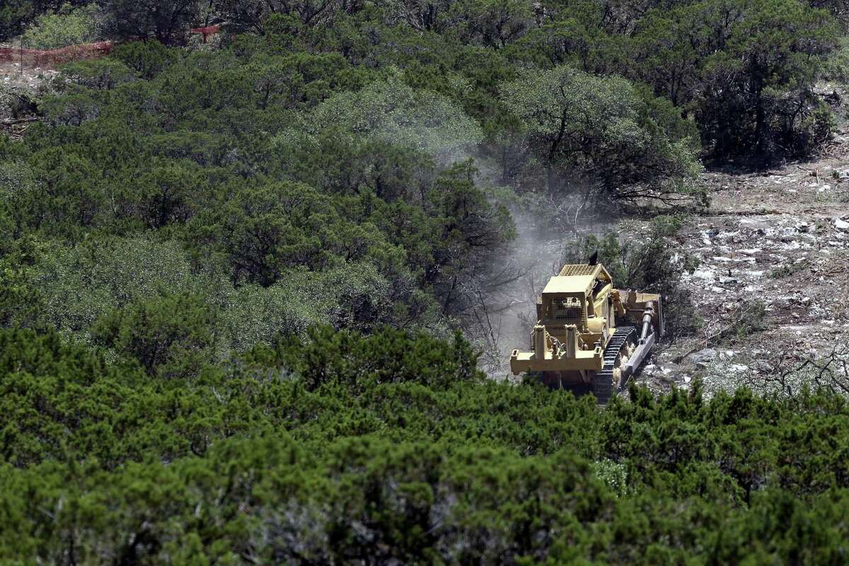 Large equipment clears land Wednesday, June 27, 2018 seen from Washita Way north west of the Loop 1604 and I-10 intersection on San Antonio's north side.