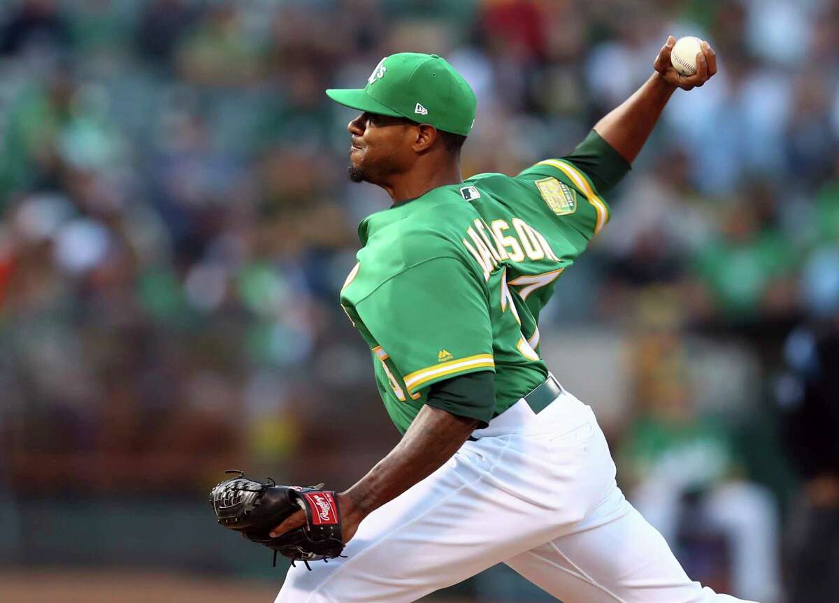 Oakland Athletics pitcher Edwin Jackson works against the Houston Astros in the first inning of a baseball game Friday, Aug. 17, 2018, in Oakland, Calif. (AP Photo/Ben Margot)