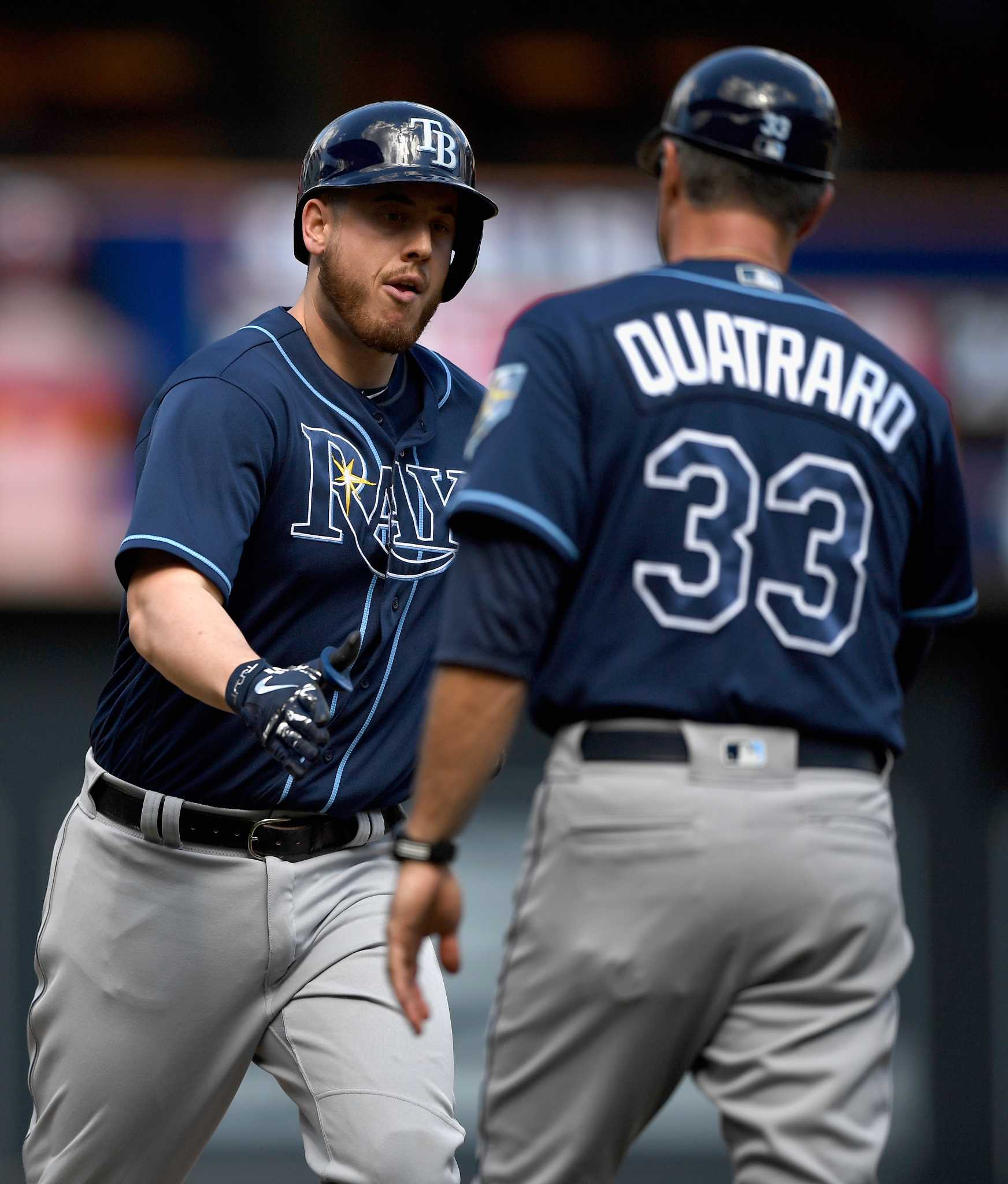 Minnesota Twins' C.J. Cron rounds the bases after hitting a home