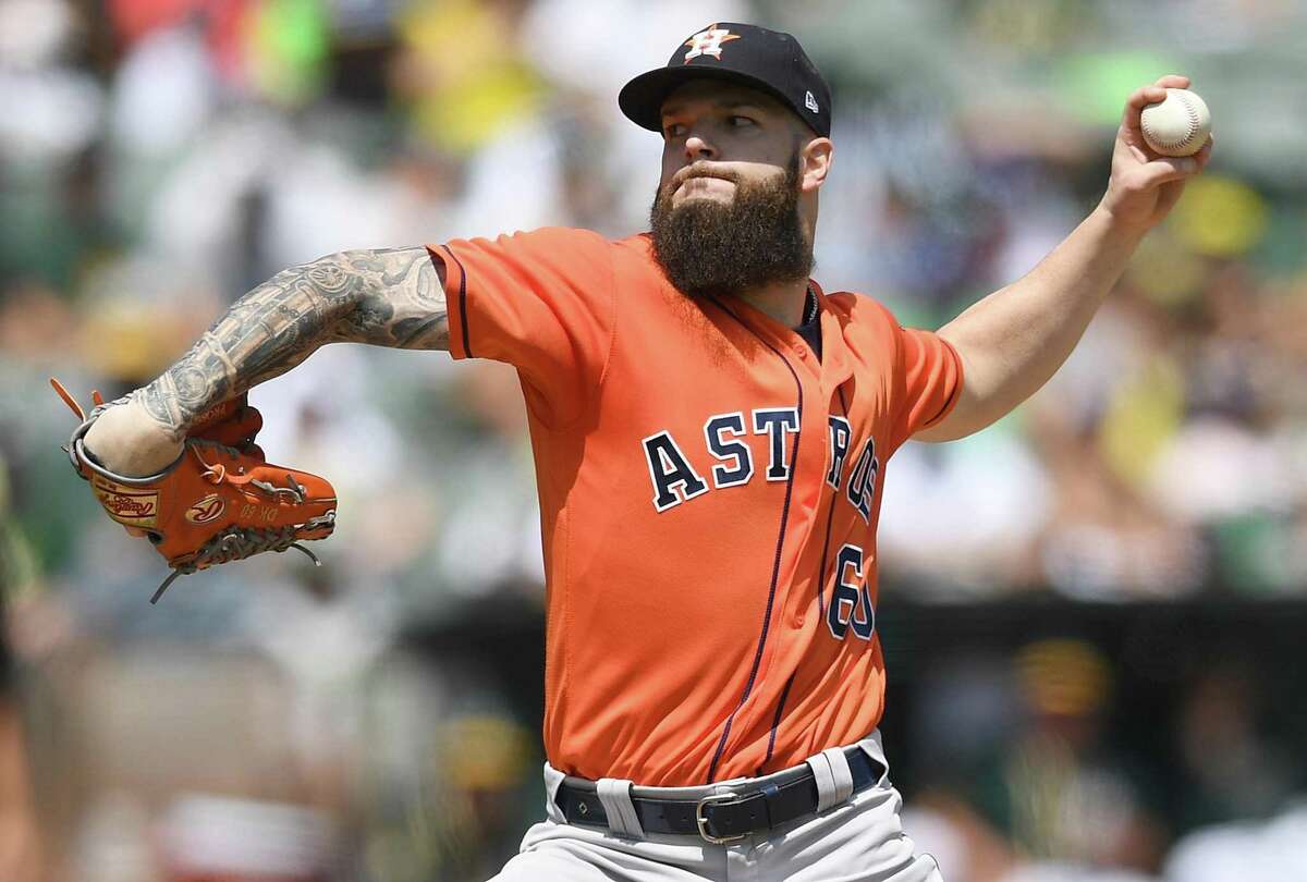 OAKLAND, CA - AUGUST 18: Dallas Keuchel #60 of the Houston Astros pitches against the Oakland Athletics in the bottom of the first inning at Oakland Alameda Coliseum on August 18, 2018 in Oakland, California. (Photo by Thearon W. Henderson/Getty Images)