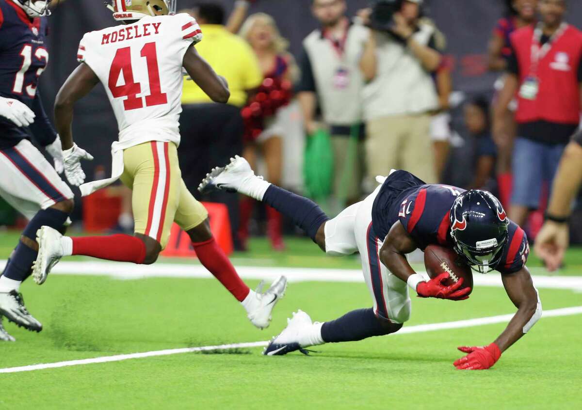 Houston Texans wide receiver Vyncint Smith (17) catches a touchdown pass from quarterback Joe Webb in the final moments during the fourth quarter of an NFL preseason football game at NRG Stadium on Saturday, Aug. 18, 2018, in Houston.