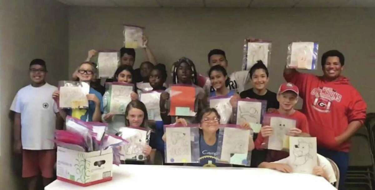7th and 8th grade students participate in the Conroe Parks and Recreation Department Totally Teens Summer Program made Craft Packets for Texas Children’s Hospital last month. This is an ongoing project of The Rotary Club of Conroe, with lots of help from the younger generation!
