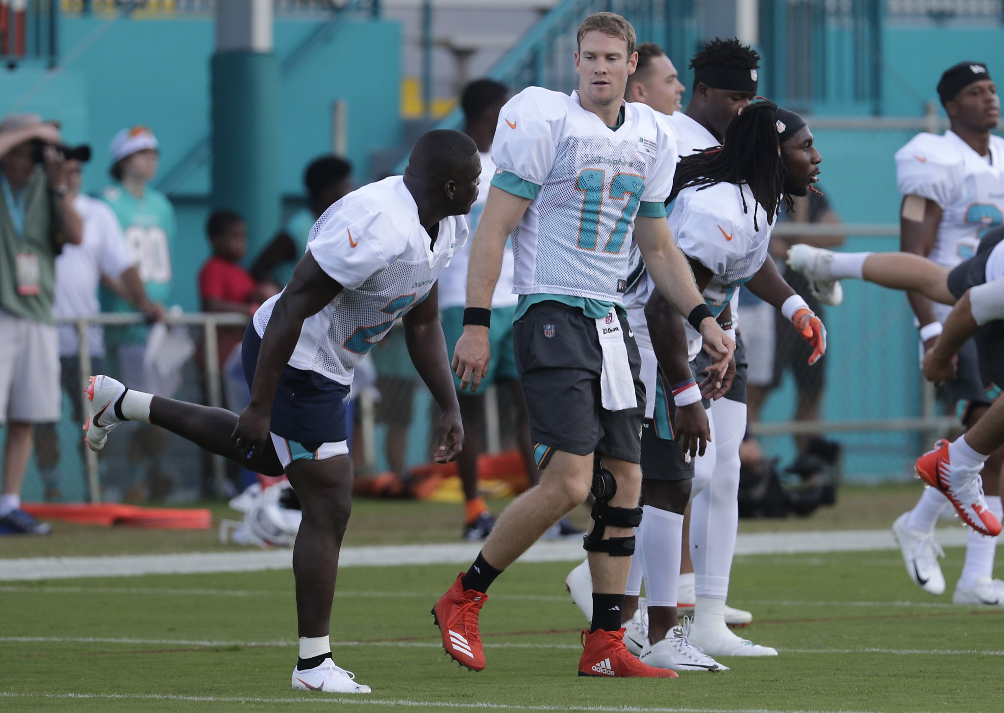 In this Monday, July 30, 2018, photo, running back Frank Gore (21) stands  on the field at the NFL football team's training camp in Davie, Fla. The  NFL's active career rushing leader