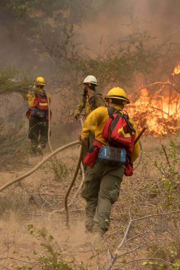 Wildfires blazing across Washington, fire risk high on Monday