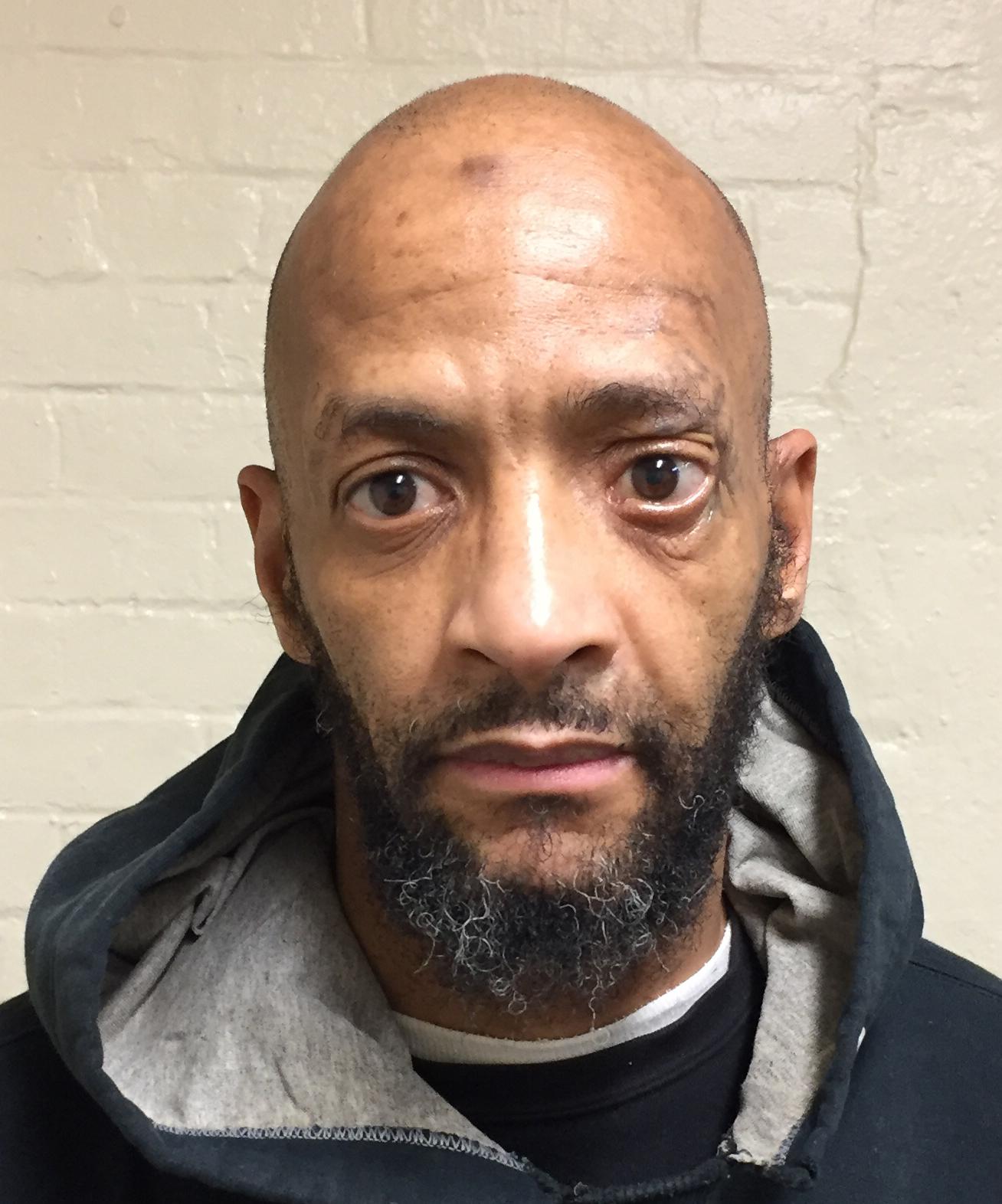 Convicted felon charged with deli break-in