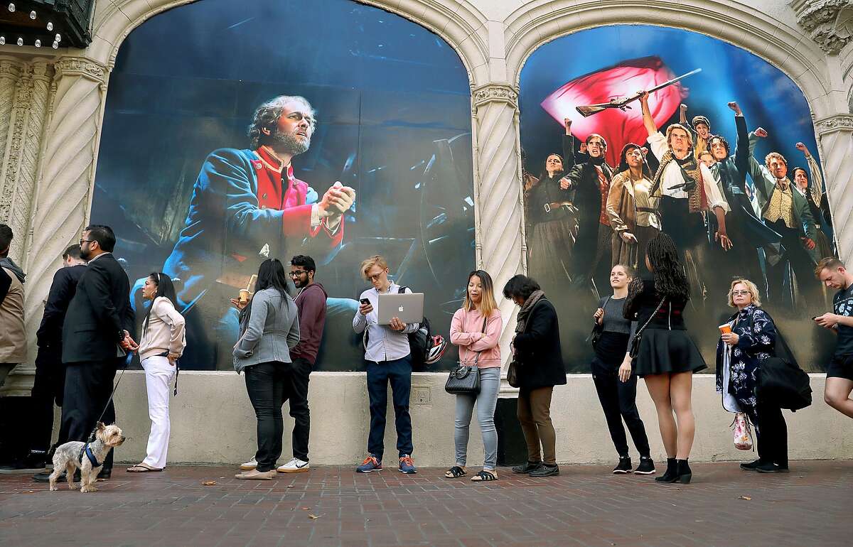 A line waits outside of the Orpheum Theater on Market Street on Tuesday, Aug. 14, 2018 in San Francisco, Calif.