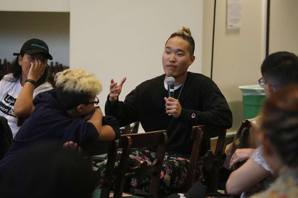 Journey to Justice rider "Bo Thai" of Los Angeles, who has been impacted by recent immigrant legislation, answers a question from the audience during the Journey to Justice press conference at Calvary Presbyterian Church on Monday, August 20, 2018 in San Francisco, Calif.