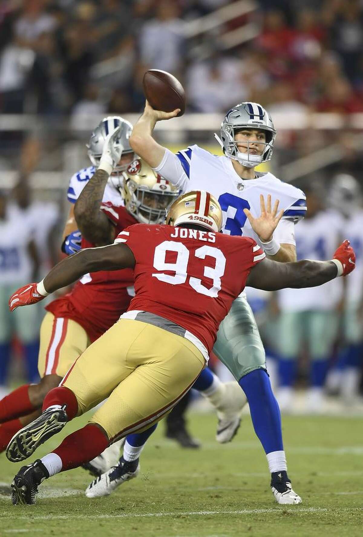 D.J. Jones puts pressure on Cowboys quarterback Mike White in the 49ers’ preseason opener. Jones had three tackles and forced a fumble in last week’s loss at Houston, where he earned the highest grade among 49ers defenders from Pro Football Focus.
