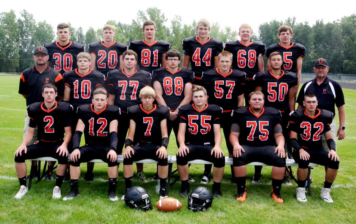 Members of the Ubly varsity football team are (front row from left) Casey Sweeney, William Spicer, Nicholas Wright, Nolan VanErp, Nathan Particka and Tyler Jones (middle row) coach Jim Becker, Ethan Lemke, Prestin Hallock, Colton Rosenthal, Adam Weber, Ethan Smalley and coach Jim Wencel (back row) Carson Heleski, Blake Bader, Isaac Warczinsky, Shane Osantowski, Austin Peruski and Ethan Peruski. (Paul P. Adams/Huron Daily Tribune)