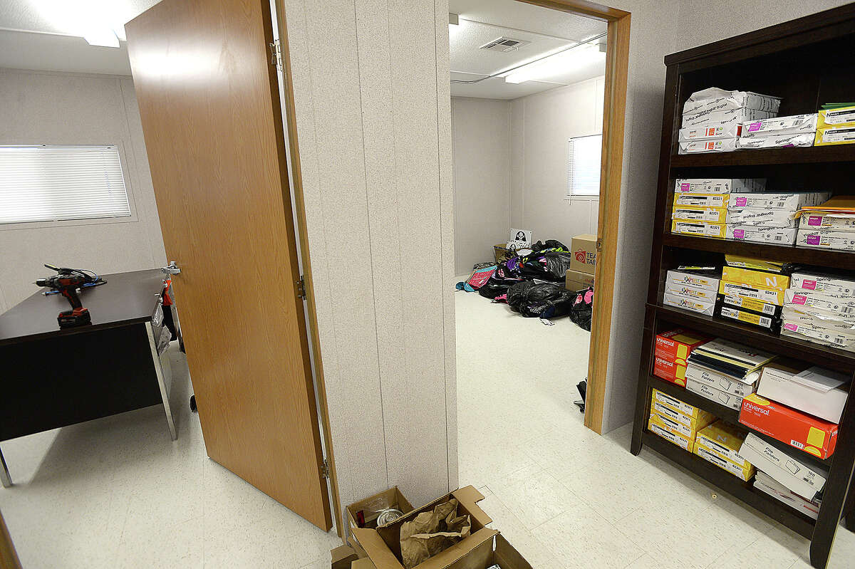 The Vidor Middle School sixth grade office is in the process of moving in at the new portables which will serve sixth graders and staff at the Vidor Junior High School campus. Fifth graders will be in portables at the high school. The middle school was one of two campuses Vidor ISD lost in Harvey's flooding, and the district is still awaiting word from FEMA on how much they will receive to remodel or build anew. The 10 portable units started arriving in June, and construction crews have been putting them together within the last two weeks, doing the plumbing and electrical work and building covered walkways connecting the units. Last year, the district shuffled its two closed campuses among other school buildings, sharing rooms and other facilities in the wake of Harvey's flooding. This year, sixth graders will be at the portables, which they anticipate will be the case for at least 2 years. Monday, August 20, 2018 Kim Brent/The Enterprise