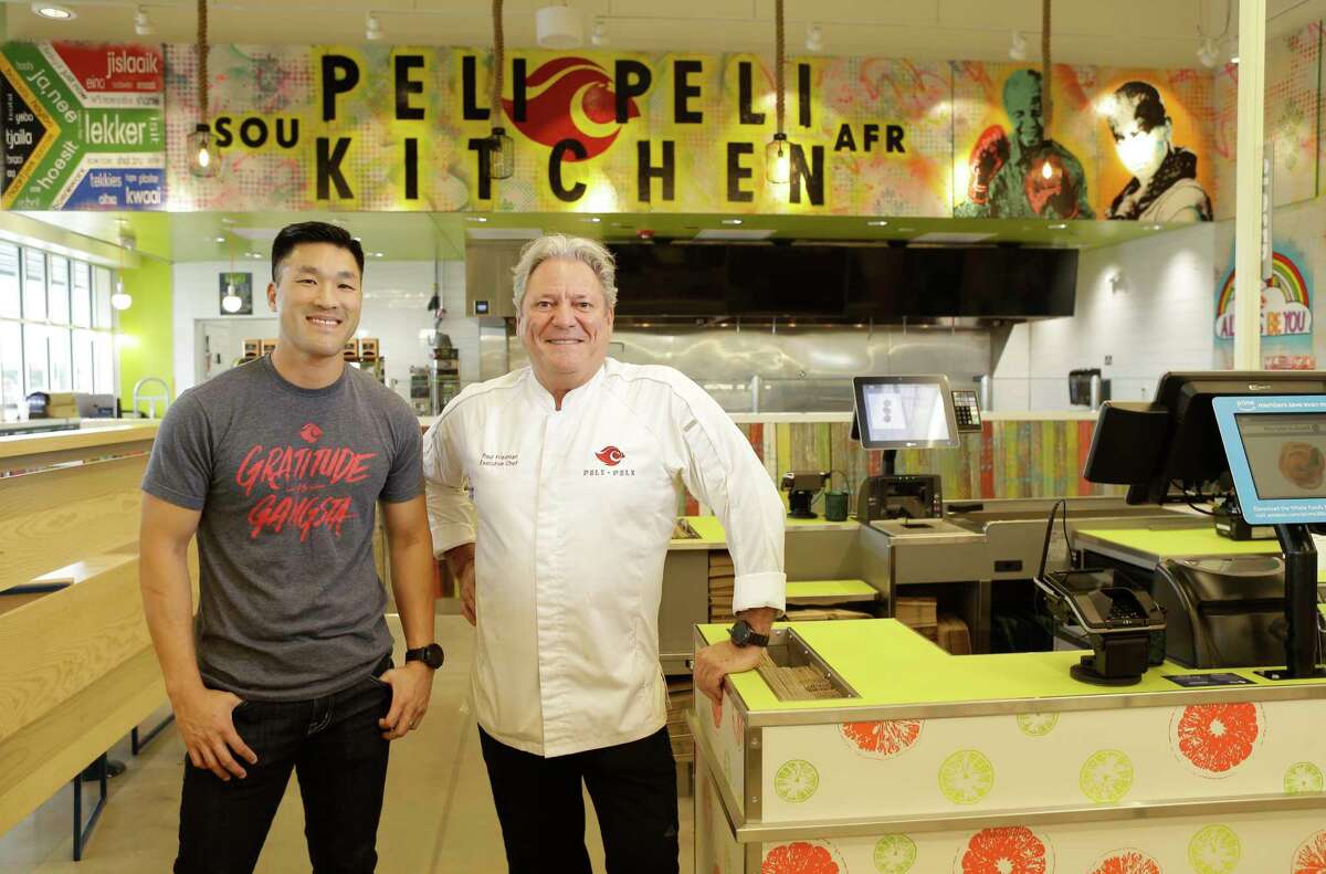 Thomas Nguyen, partner and marketing director, and Paul Friedman, executive chef/partner, at Peli Peli Kitchen located inside the new Whole Foods Market 365, 101 North Loop West.