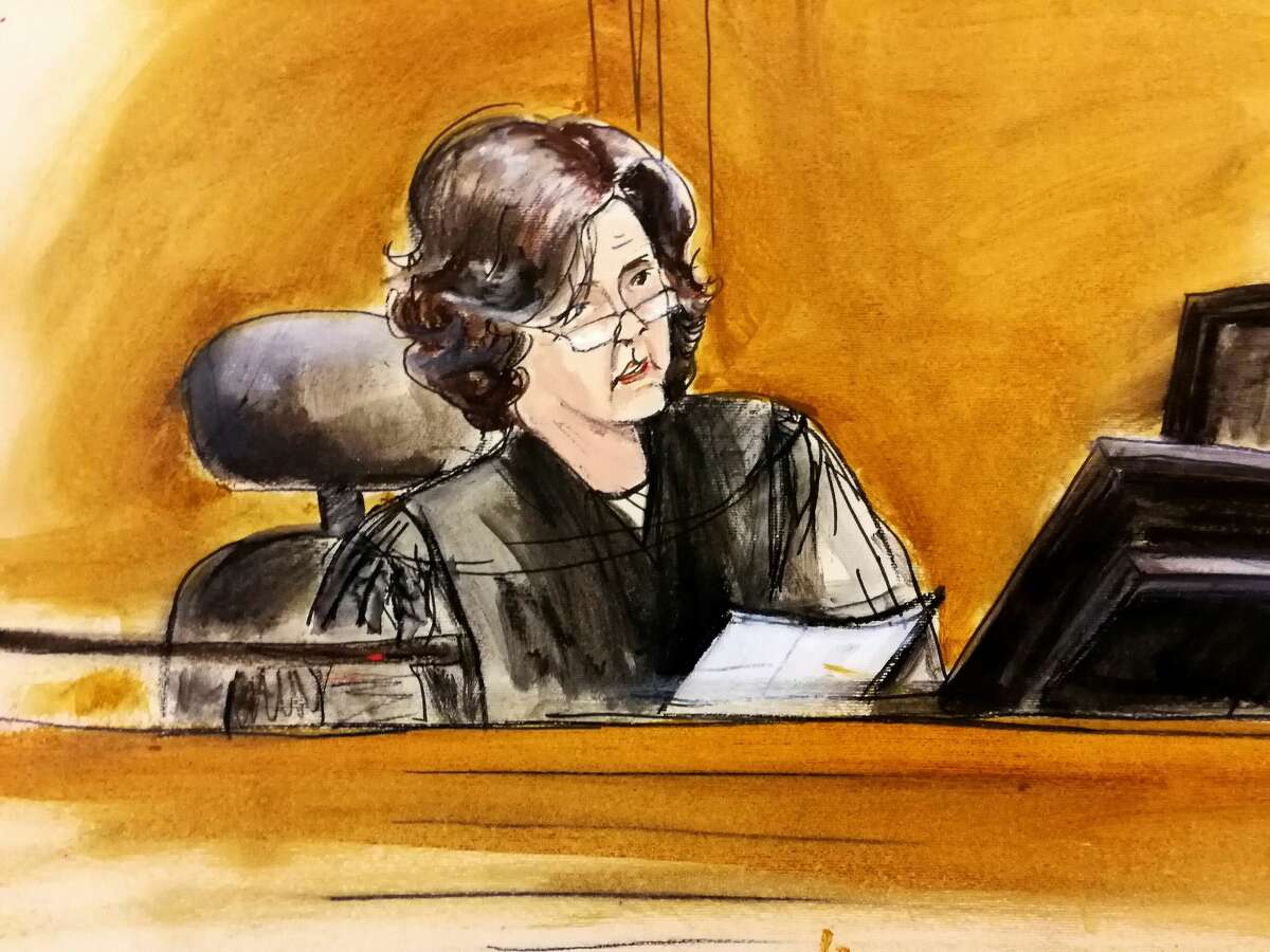 FILE - In this April 16, 2018 file courtroom sketch, U.S. District Judge Kimba Wood presides over a federal court hearing where attorneys for President Donald Trump and Michael Cohen tried to persuade the judge to delay prosecutors from examining records and electronic devices seized in New York.