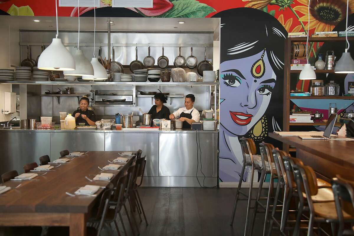 Viewof the kitchen from part of the dining room of Besharam, a new Gujarati (West Indian) restaurant seen on Thursday, Aug. 16, 2018 in San Francisco, Calif.