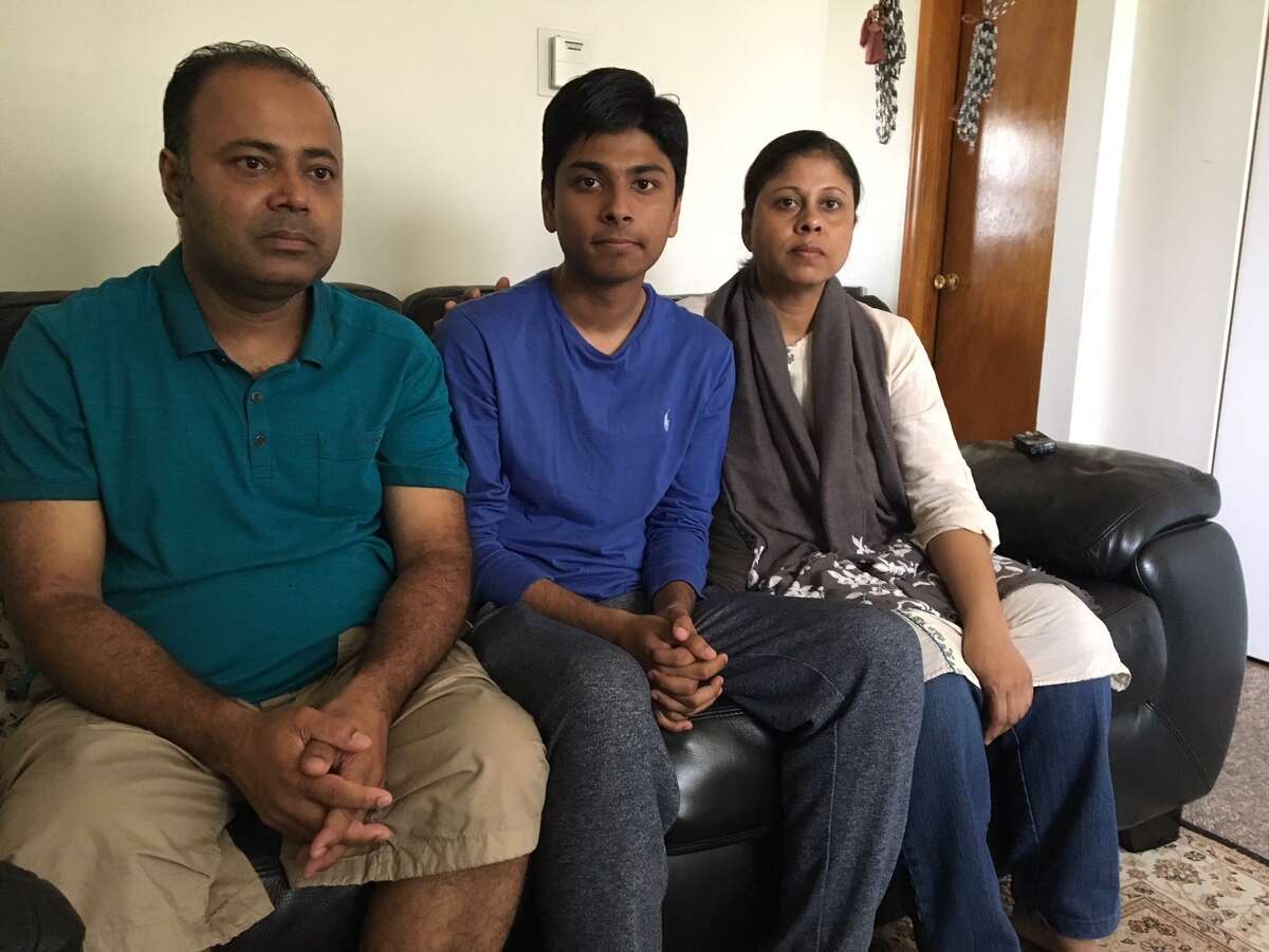 Anwar Mahmud, left, his son Samir Mahmud and his wife Salma Sikandar are anxious about her deportation appeal.
