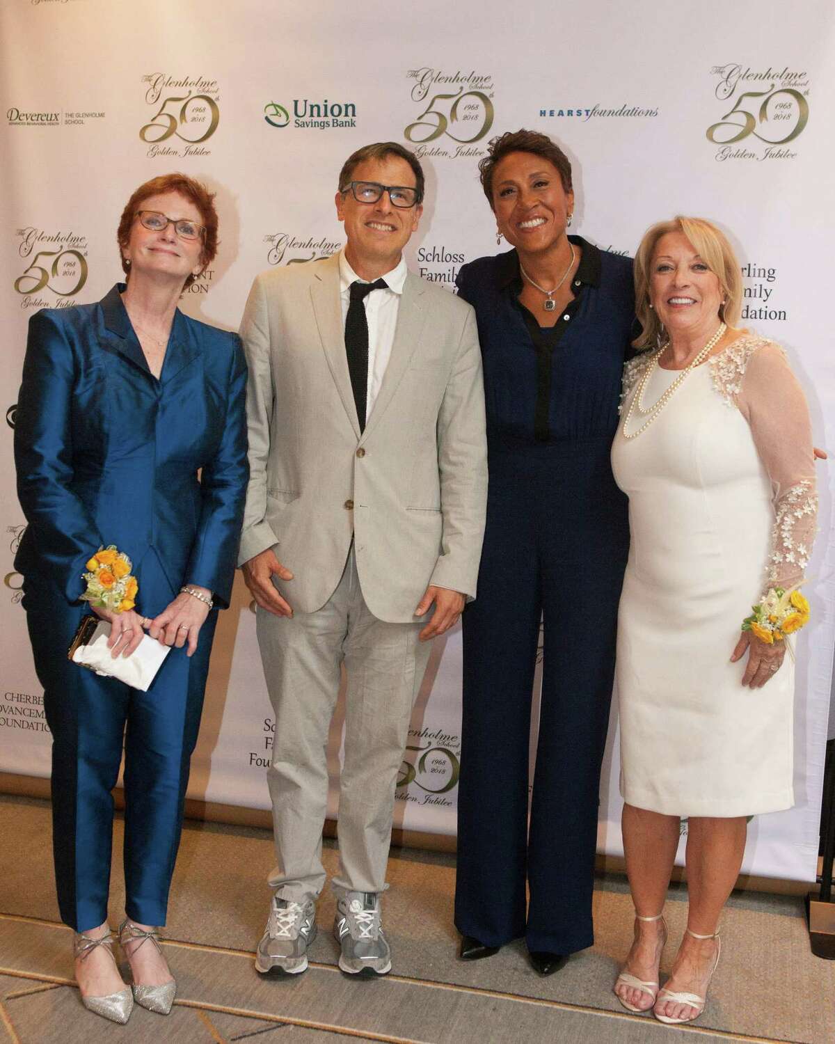 The Glenholme School in Washington recently hosted its 50th Jubilee Gala at Ethan Allen Hotel in Danbury. In attendance were, from left to right, Barbara Feeney, Glenholme Board Chairman, film director David O. Russell, guest emcee Robin Roberts of ABCs Good Morning America, and Glenholme Executive Director Maryann Campbell.