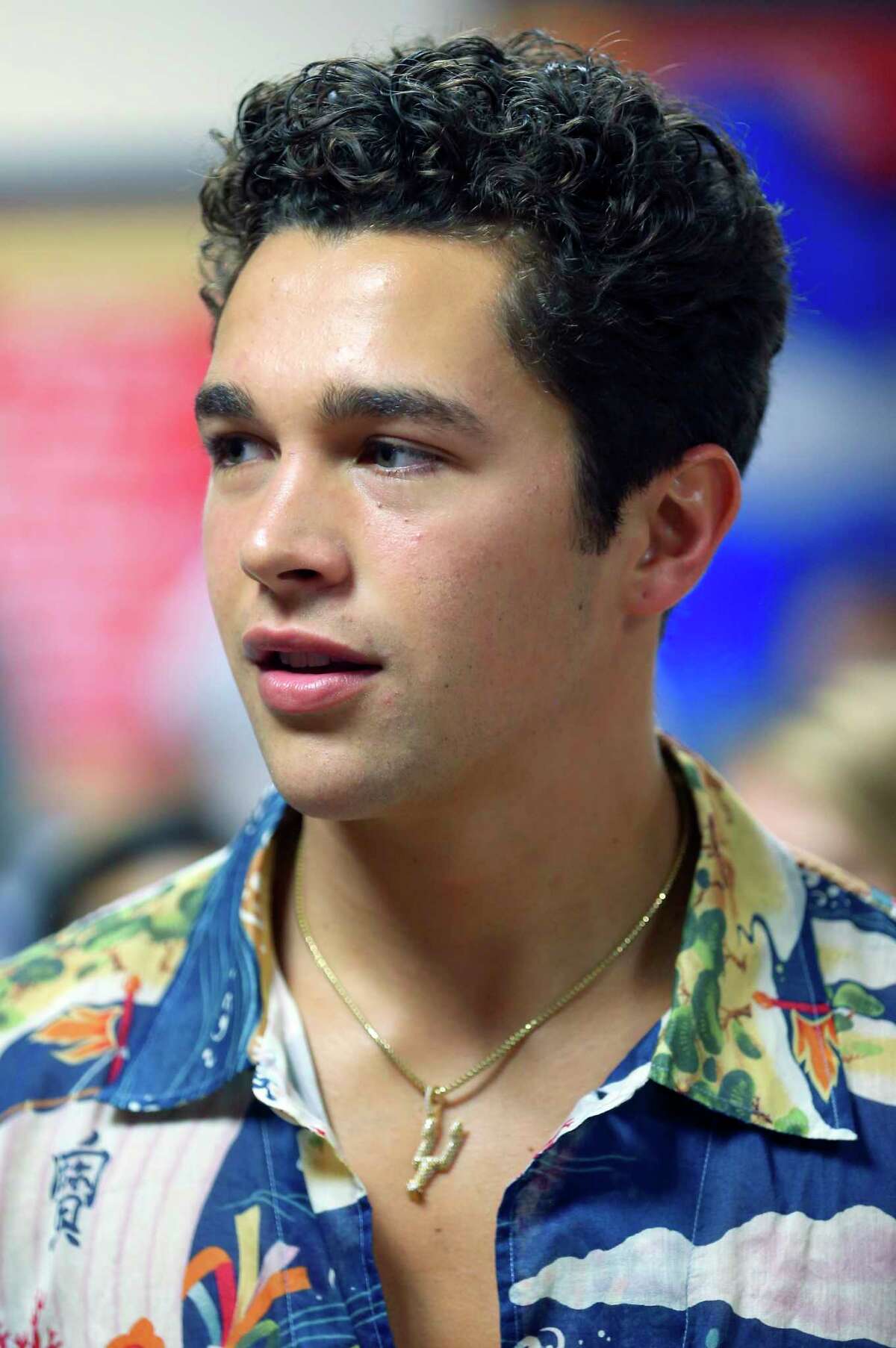 San Antonio native Austin Mahone is seen Tuesday, Aug. 21, 2018 at Palo Alto Elementary on the city's south side. In addition to performing two songs for the school's students, Mahone helped distribute school supplies from San Antonio Youth Educational Support Project.