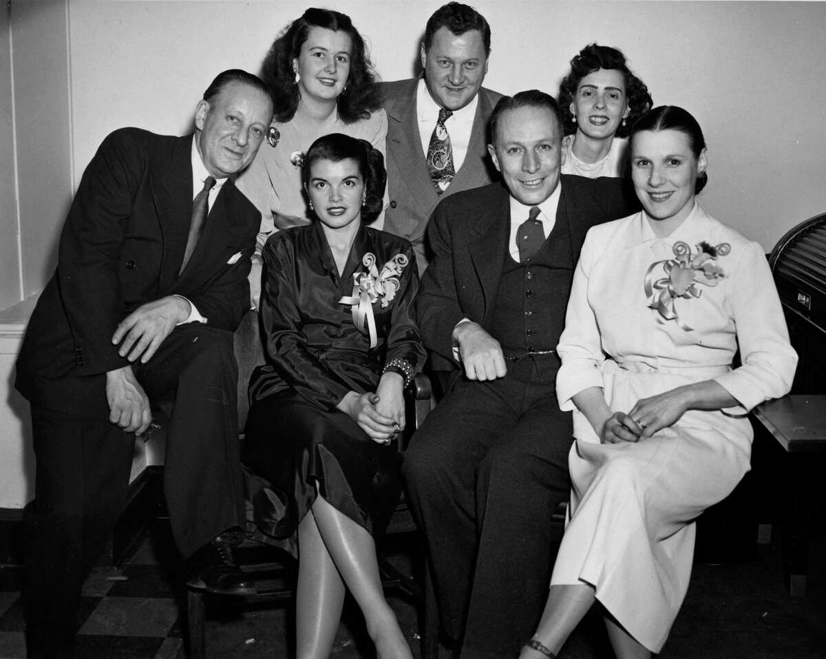 Photo courtesy of Albany Institute of History & Art -- 1937 photo of Mayor Erastus Corning (second from right ,front row) and Dorothy (Polly) Noonan (front row, right.) Other people are unidentified. Photo taken around the time Corning was elected to State Senate.