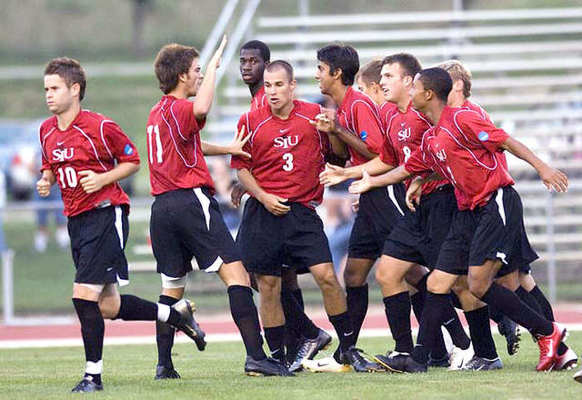 Members of the 2004 SIUE men’s soccer team celebrate a win. The team, which finished second in the NCAA Division II National Tournament, is one of several teams and individuals named to the SIUE Hall of Fame