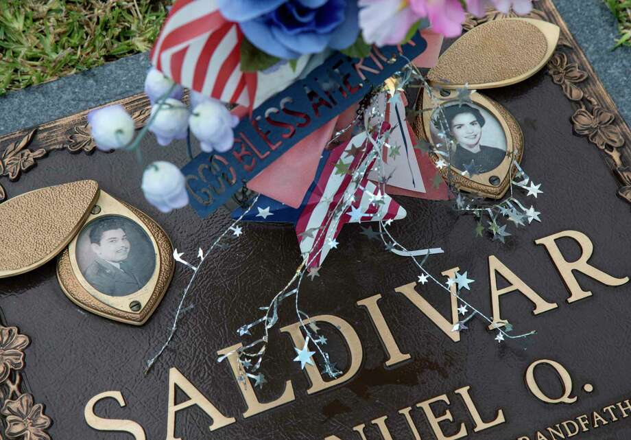 The graves of Manuel and Belia Saldivar, who drowned in a van with four great-grandchildren during Hurricane Harvey, photographed Thursday, Aug. 9, 2018, in Houston. Photo: Jon Shapley, Staff Photographer / © 2018 Houston Chronicle
