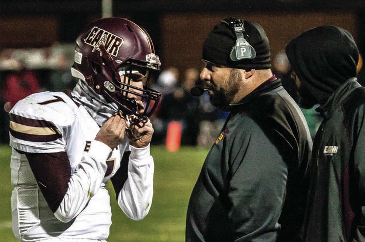 EA-WR coach Garry Herron (right) and his Oilers will open the season at 7 p.m. Friday at home against non-conference Breese central. Above, Herron talks with now-graduated quarterback Justin englar during a game last season.