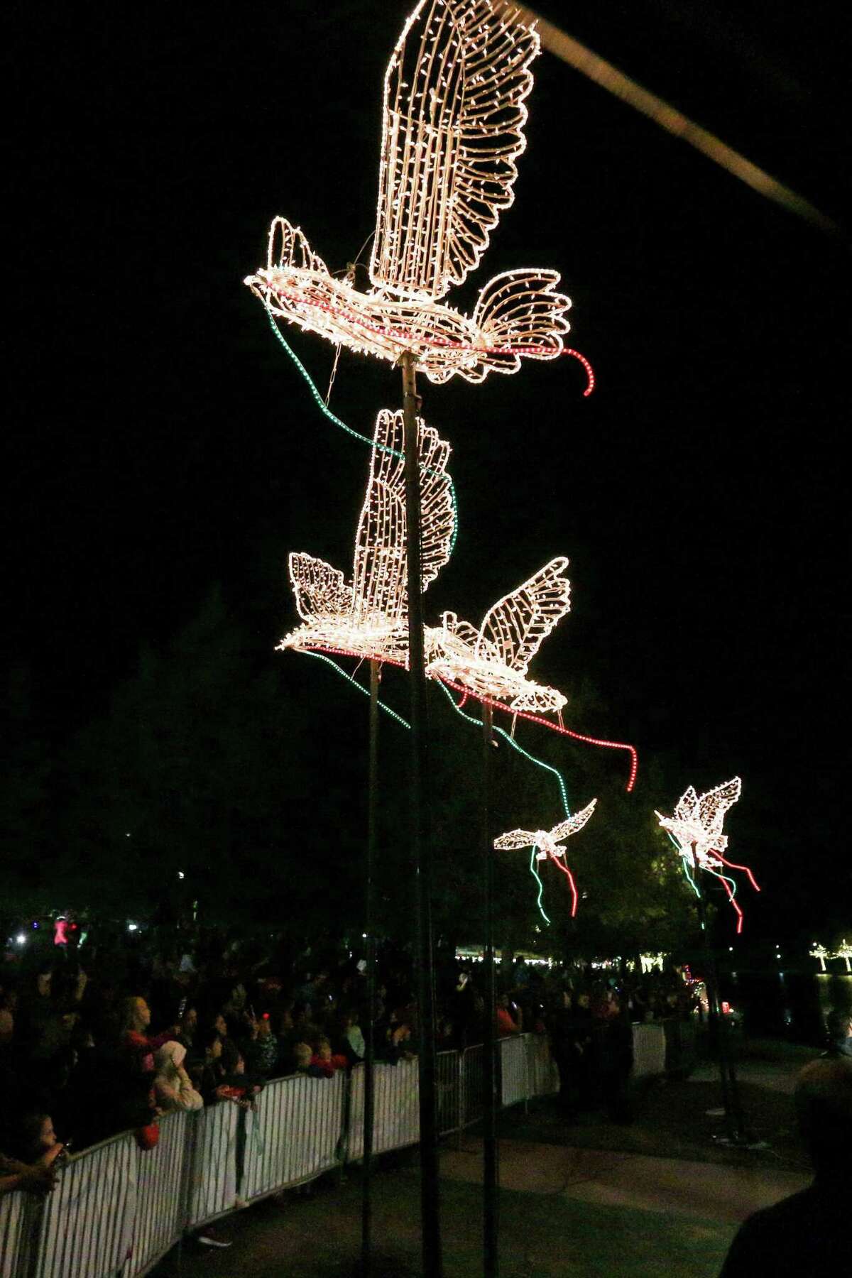 The annual Lighting of the Doves and greeting of Santa Claus will be a little different this year tha in past events. The annual tradition will happen on Saturday, Nov. 21, with a time to be determined. Several dove sculptures burst to light during the Lighting of the Doves event on Saturday, Nov. 18, 2017, at Town Green Park.