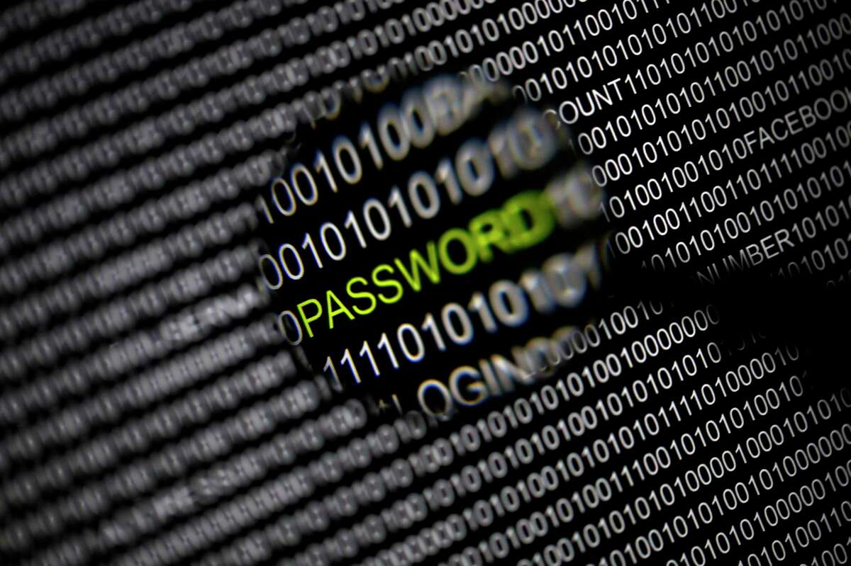 File picture illustration of the word 'password' pictured through a magnifying glass on a computer screen, taken in Berlin May 21, 2013. Security experts warn there is little Internet users can do to protect themselves from the recently uncovered "Heartbleed" bug that exposes data to hackers, at least not until vulnerable websites upgrade their software. Researchers have observed April 8, 2014, sophisticated hacking groups conducting automated scans of the Internet in search of Web servers running a widely used Web encryption program known as OpenSSL that makes them vulnerable to the theft of data, including passwords, confidential communications and credit card numbers. OpenSSL is used on about two-thirds of all Web servers, but the issue has gone undetected for about two years. REUTERS/Pawel Kopczynski/Files (GERMANY - Tags: CRIME LAW SCIENCE TECHNOLOGY)