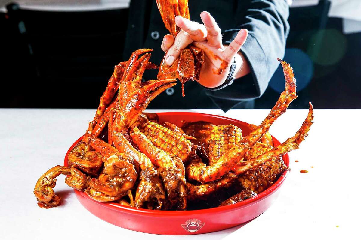 The Date Night platter at Dallas-based Shell Shack's new location on Washington Avenue has one pound of snow crab, one pound of boiled shrimp, one pound of king crab, four pieces of corn, six potatoes and six pieces of sausage. The seafood dinner is brought to the table in a seasoning bag.