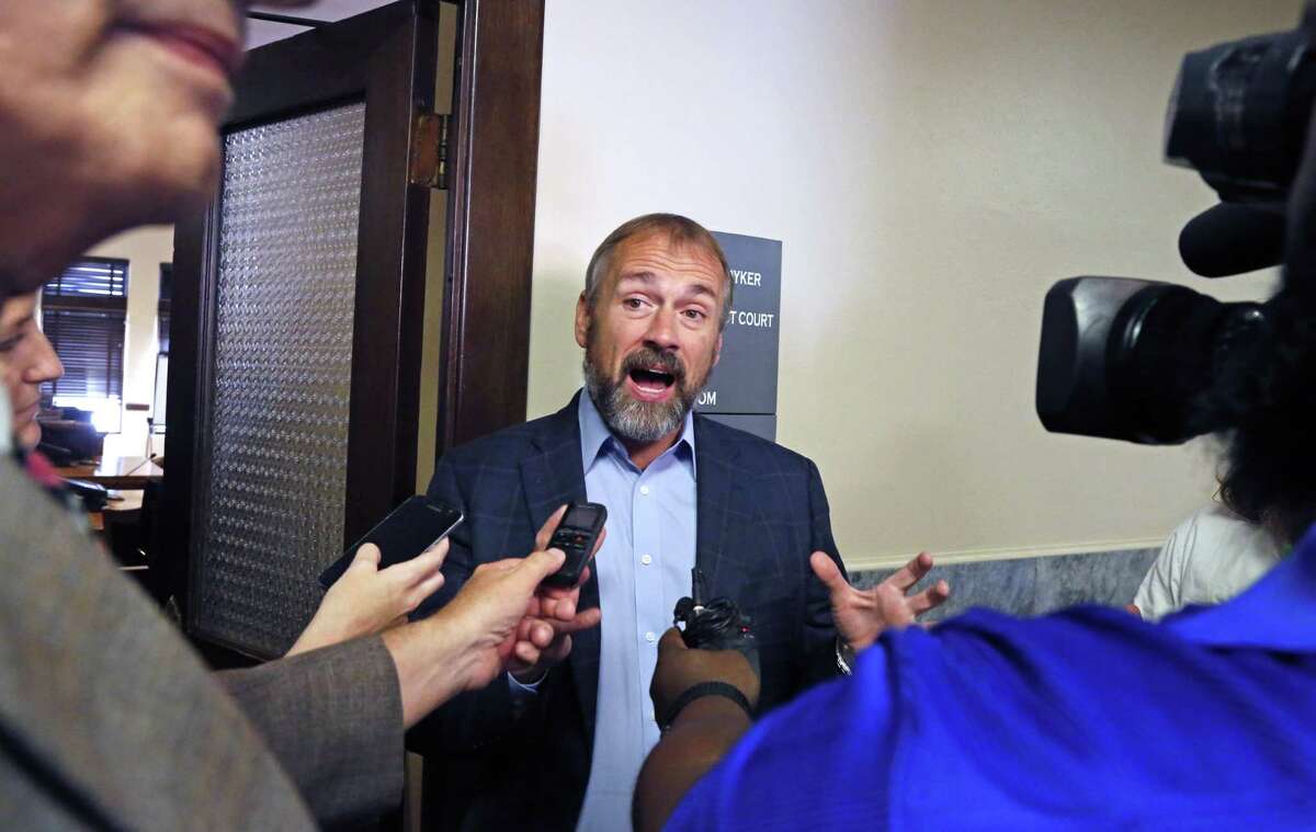 Christian Archer, campaign manager for Secure San Antonio meets with the press after the proceedings on Wednesday, Aug.15, 2018. The Secure San Antonio's Future PAC will be in court to argue that a judge should toss out the petitions filed by the local fire union because, the PAC alleges, the fire union illegally funded the petition campaign.