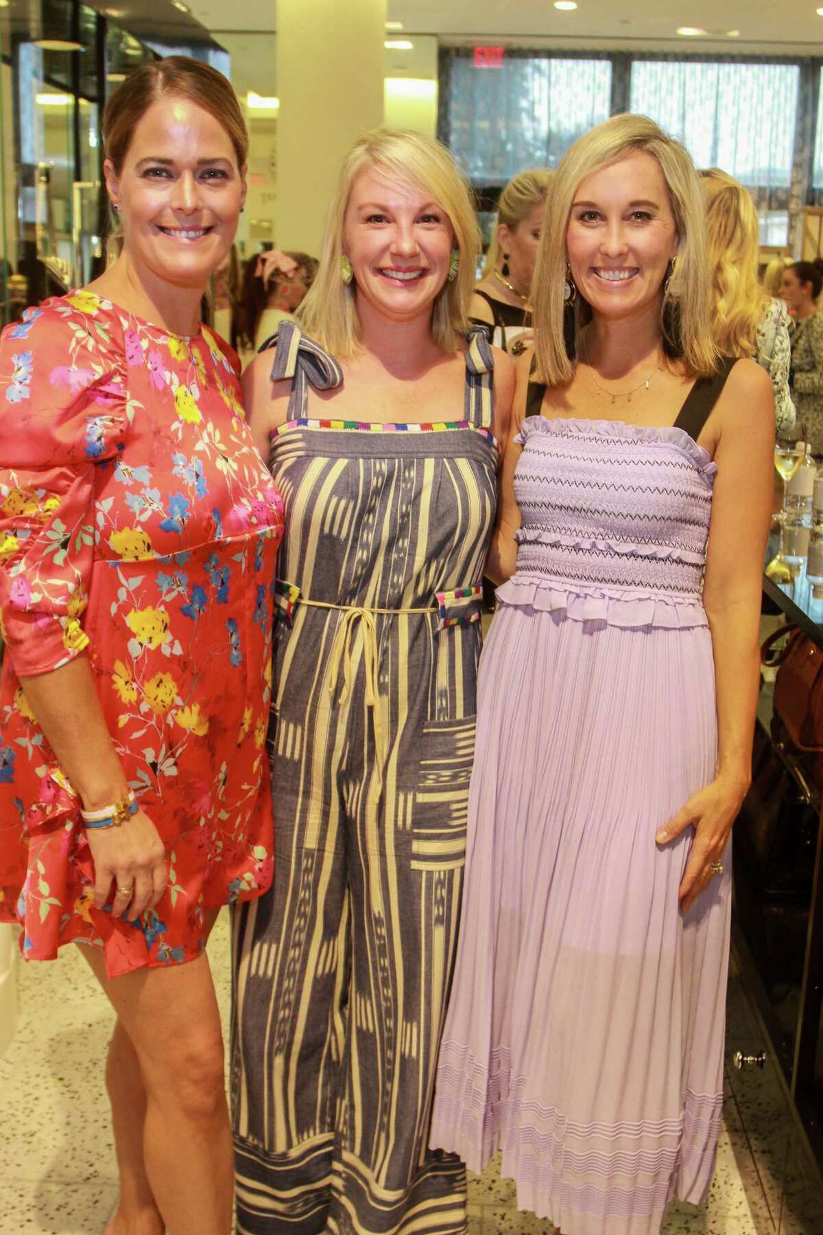 Lucia Clark, from left, Dawn Persia and Lexie Boudreaux at Dress for Success's Women of Wardrobe annual Summer Soiree at Tootsies.