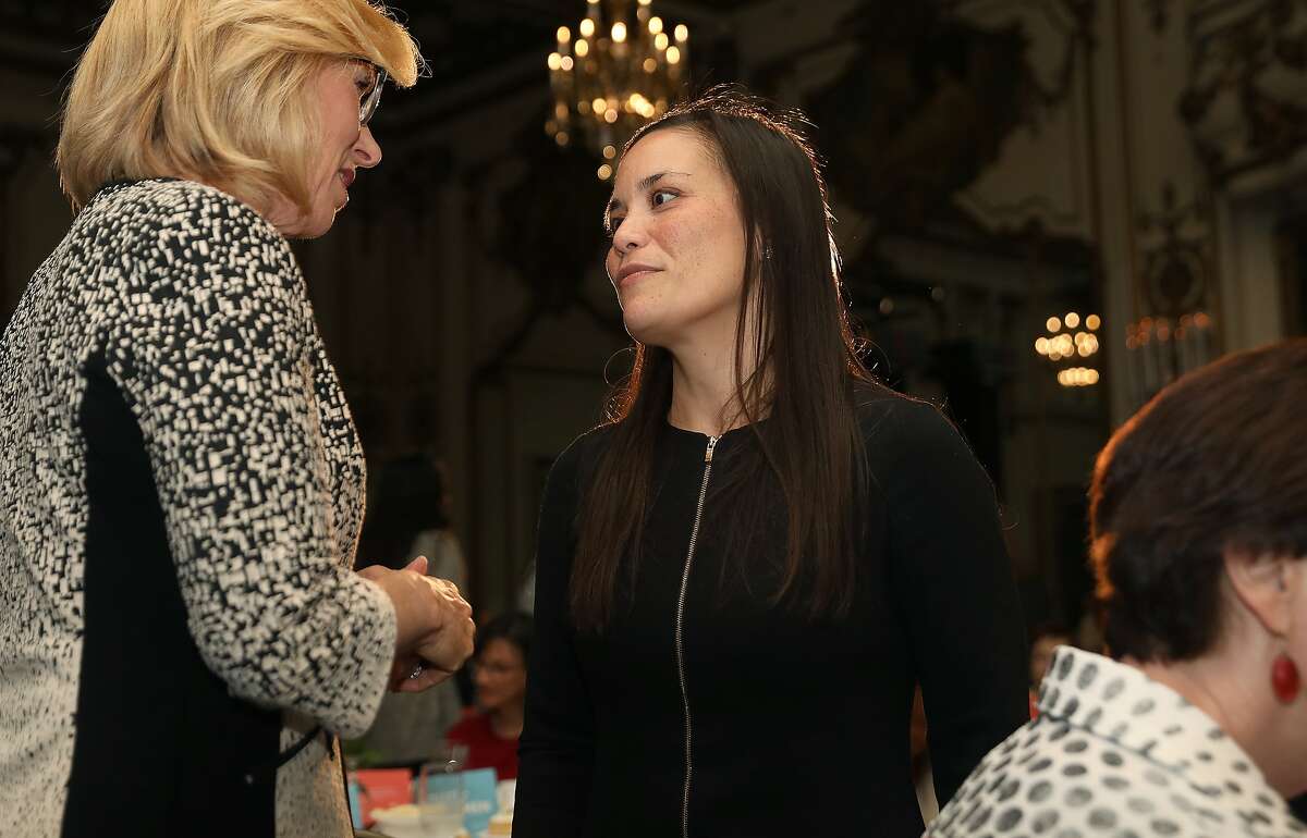 Gina Ortiz Jones (middle), candidate for U.S. House (TX-23) seen at an EMILY's List luncheon at the Fairmont Hotel on Friday, Aug. 17, 2018 in San Francisco, Calif.