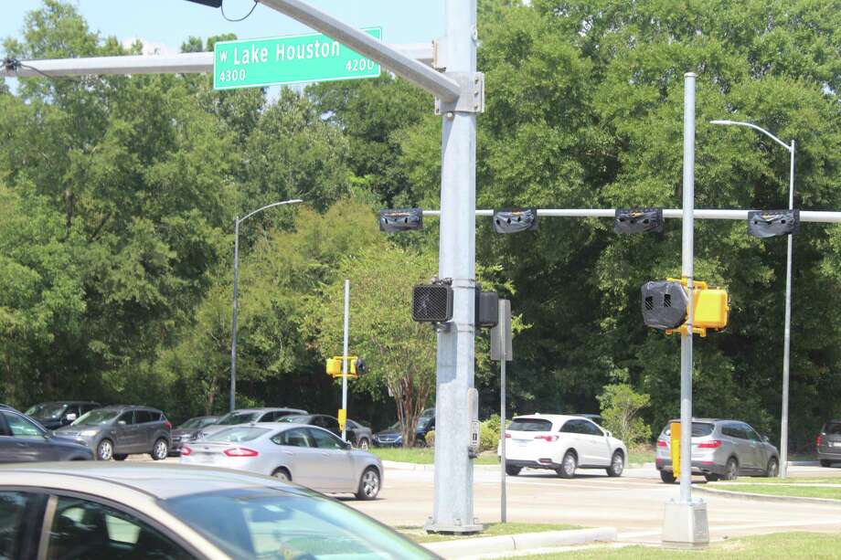 Traffic signal requirements delay completion of Kingwood intersection ...