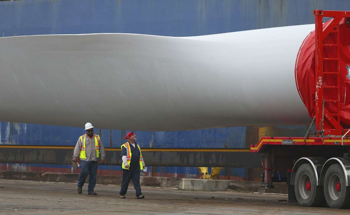 Giant wind turbine blades are offloaded from a freighter Friday January 20, 2017 at the Port of Corpus Christi. Parts for wind turbines that are being erected in the United States come from countries across the globe such as Spain and Brazil. These blades are 63 meters long and are made of carbon fiber. The Port of Corpus Christi started receiving wind energy cargo in 2006.