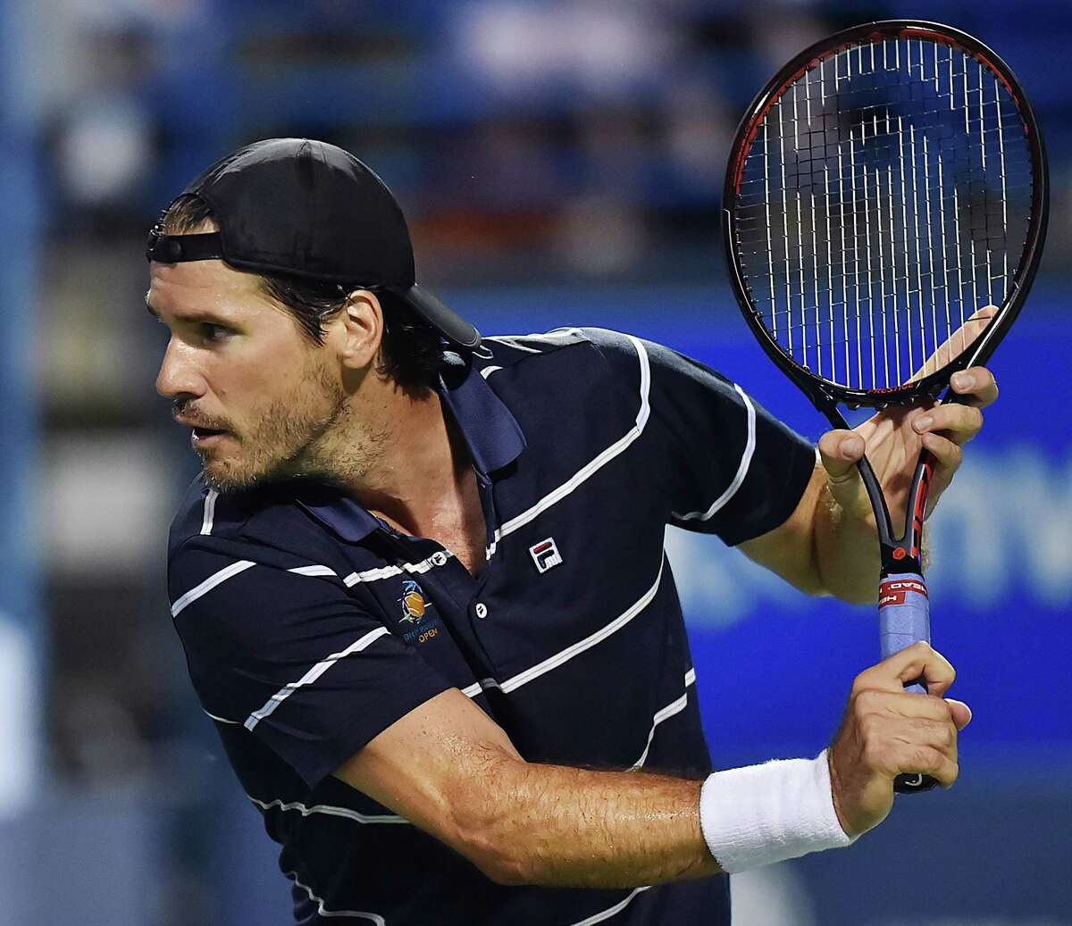 Germany's Tommy Haas returns a shot to USA's James Blake on Stadium Court Thursday, August 23, 2018, in the Invesco series QQQ Men's Legends at the Connecticut Open at the Connecticut Tennis Center at Yale in New Haven. Blake, 6-4.