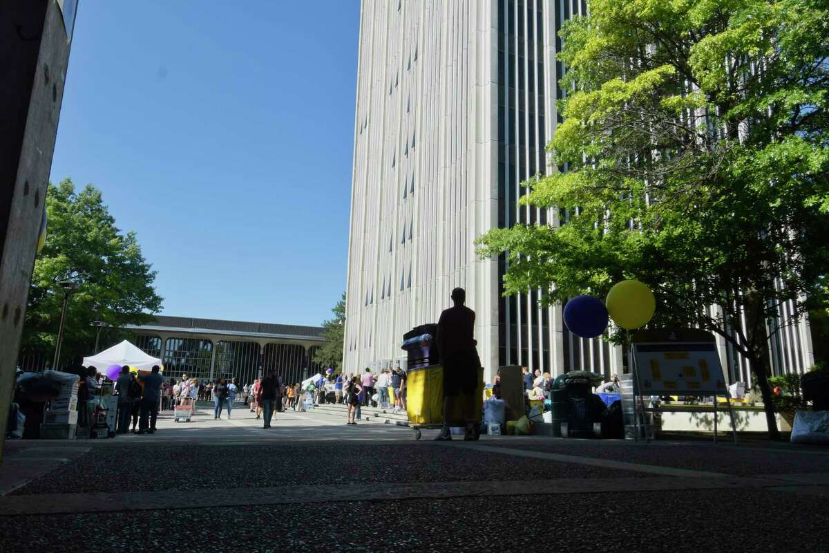 Incoming students and family members wait in line to use the elevators in the Indian Quad tower during UAlbany freshman move-in day on Thursday, Aug. 23, 2018, in Albany, N.Y. The school is welcoming 2,750 freshmen this year. (Paul Buckowski/Times Union)
