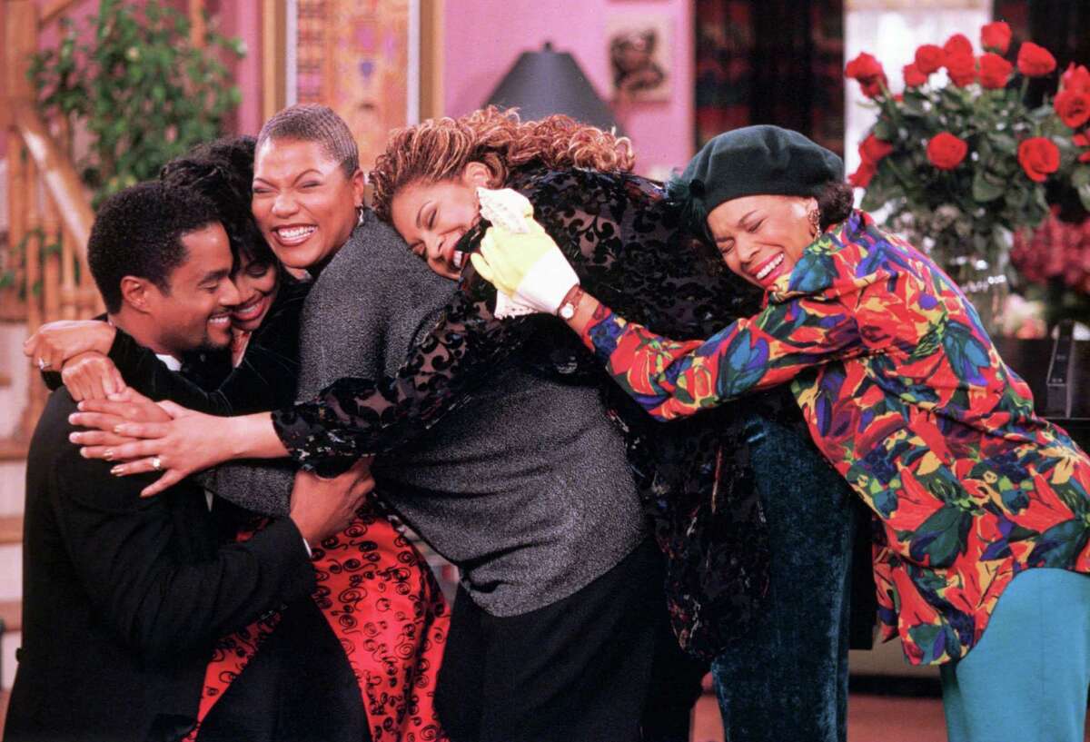 119712 LIVING SINGLE: Regine (Kim Fields Freeman, second from L) accepts Dexter Knight's (Donald Franklin, L) marriage proposal while her roommates, Khadijah (Queen Latifah, C) and Synclaire (Kim Coles, second from R), and her mother (Chip Hurd, R) share in a group hug in the LIVING SINGLE episode "Three Men and a Buckeye" Thursday, Nov. 13 (8:00-8:30 PM ET/PT) on FOX. FOX BROADCASTING COMPANY CR: RON TOM