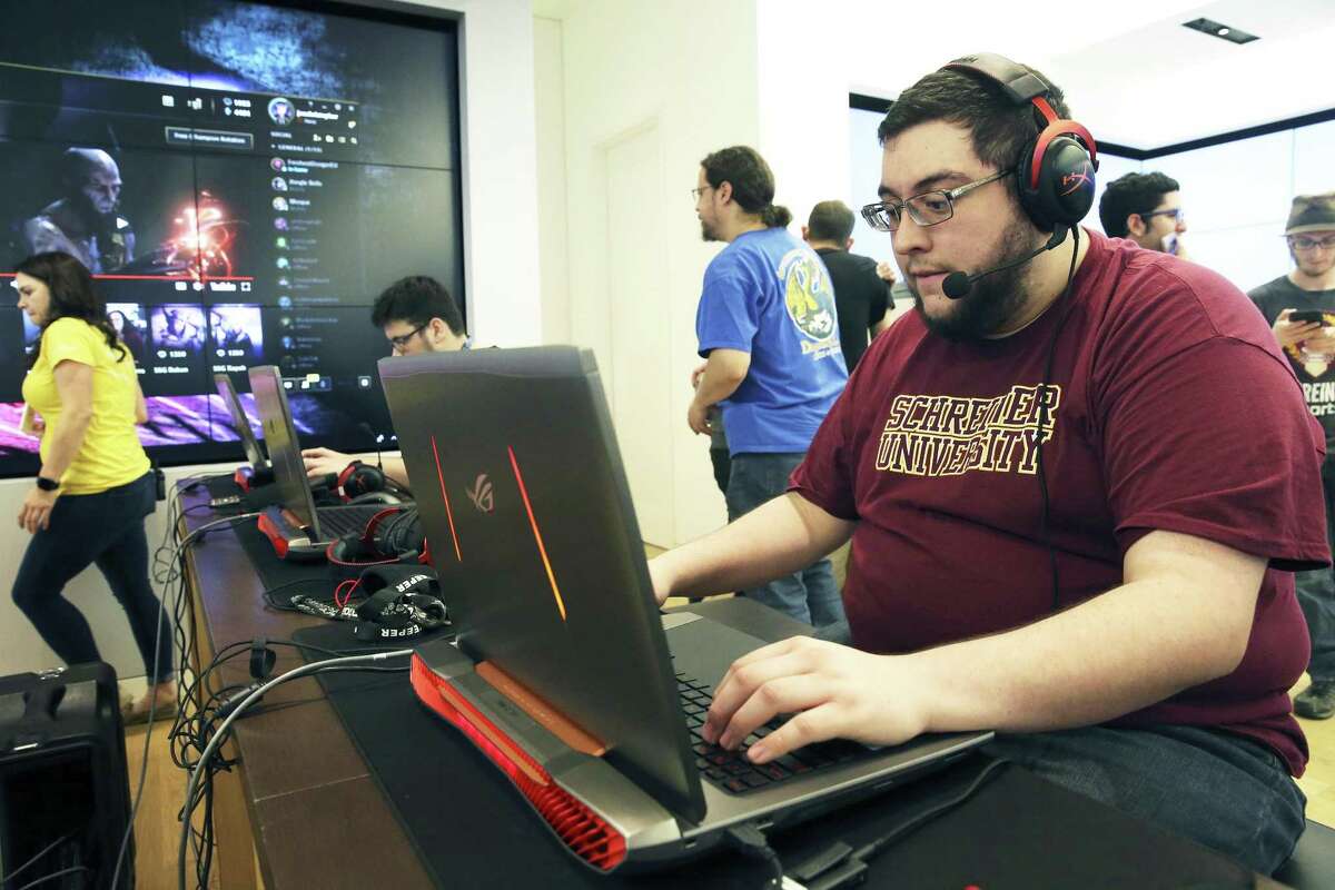 Daniel De Jesus Turgeon, already a student at Schreiner University, competes as the school holds a free esports tournament at the Microsoft Store at The Shops at La Cantera, where gamers can learn about $40,000 scholarships to attend the college. Turgeon is one of those scholarship recipients for joining Schreiner’s new esports varsity program.