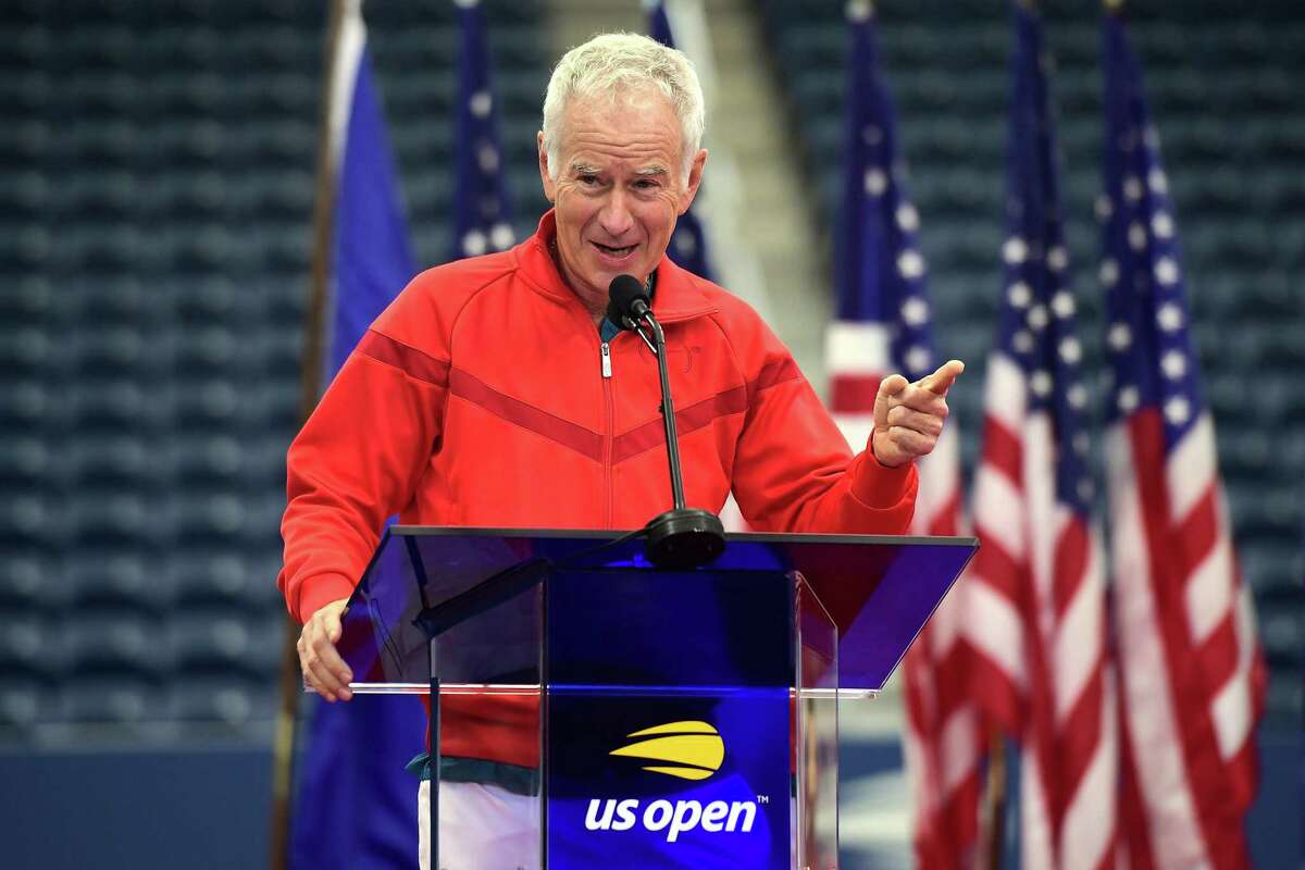 John McEnroe speaks during the Louis Armstrong Stadium dedication ceremony Wednesday at the USTA Billie Jean King National Tennis Center in New York City.