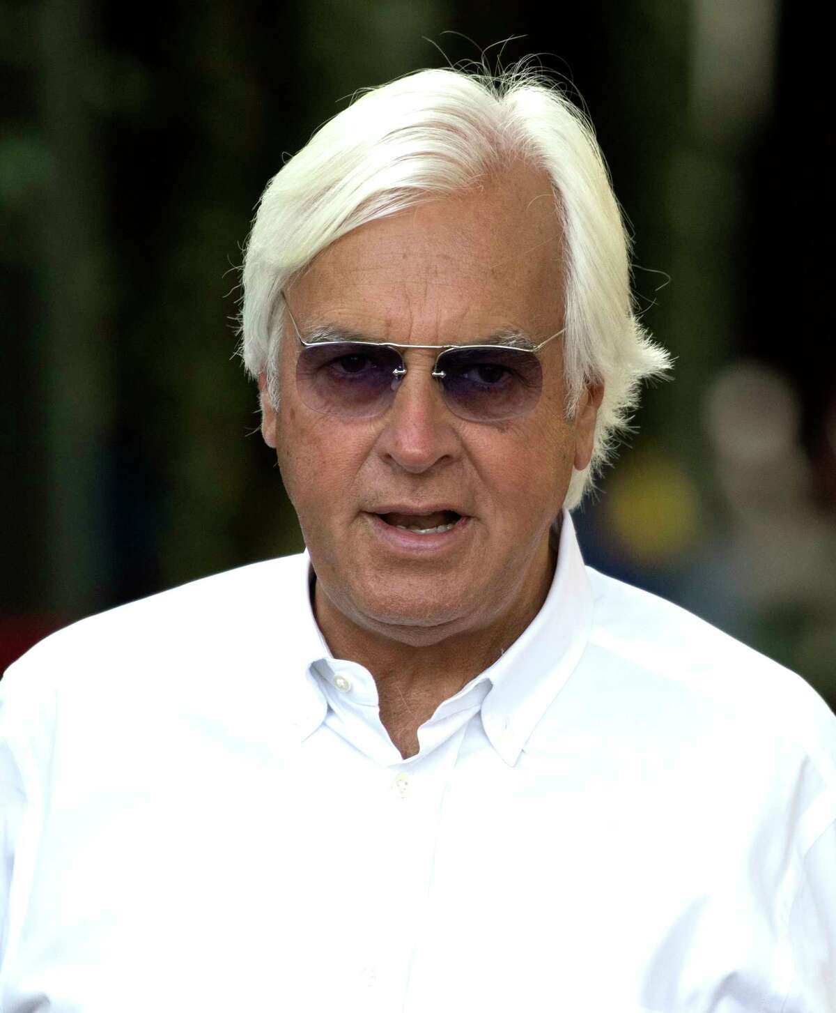 Horse trainer Bob Baffert, in Saratoga Springs in 2018, is suspended from racing horses in Kentucky after a ruling Friday from the Kentucky Horse Racing Commission upheld a ban that was instituted after Kentucky stewards disqualified his 2021 Kentucky Derby-winning horse Medina Spirit, who failed a post-race drug test.
