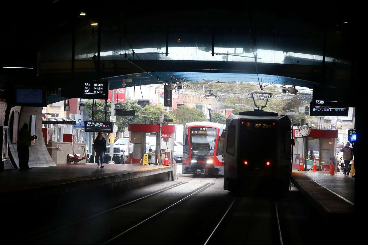 Muni Metro light rail trains roll through the West Portal station in San Francisco, Calif. on Saturday, Aug. 25, 2018. Muni is getting a new rider-information system for $89 million, while ancient, floppy-disk computers still route the trains.