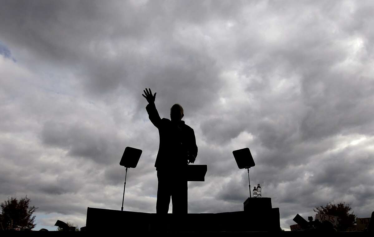 FILE - In this Oct. 18, 2008, file photo, Republican presidential candidate Sen. John McCain, R-Ariz., waves to the crowd at a campaign rally in Woodbridge, Va. Aide says senator, war hero and GOP presidential candidate McCain died Saturday, Aug. 25, 2018. He was 81. (AP Photo/Carolyn Kaster, File)