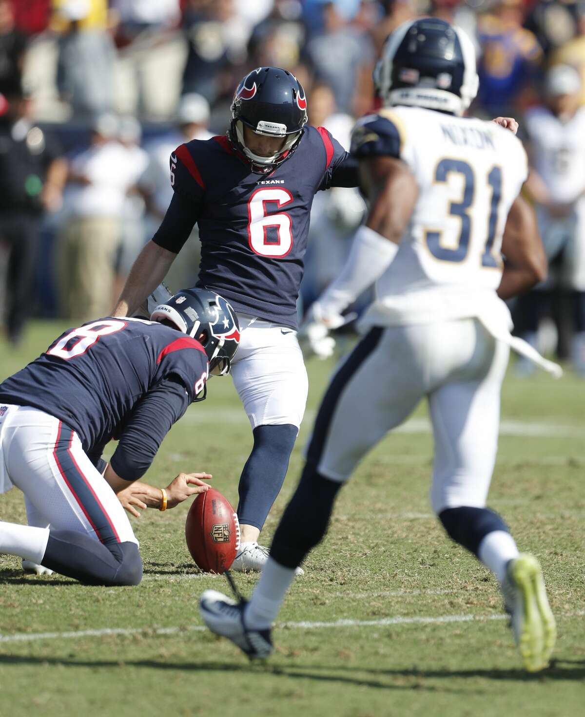 Houston Texans kicker Nick Rose (6) attempts a 57-yard field goal against the Los Angeles Rams that he did not convert during the fourth quarter of an NFL preseason football game at the Los Angeles Memorial Coliseum on Saturday, Aug. 25, 2018, in Los Angeles.