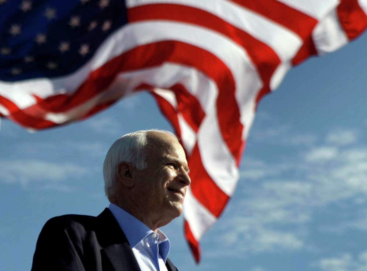 FILE - In this Nov. 3, 2008 file photo, Republican presidential candidate Sen. John McCain, R-Ariz. speaks at a rally outside Raymond James Stadium in Tampa, Fla. McCain's family says the Arizona senator has chosen to discontinue medical treatment for brain cancer. (AP Photo/Carolyn Kaster))